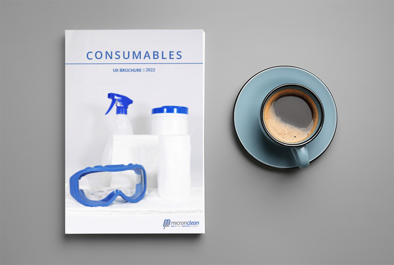 The Micronclean consumables brochure and a cup of coffee on a table.